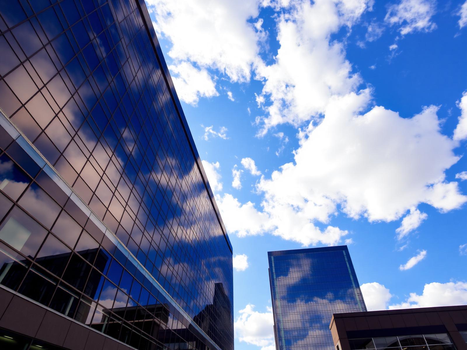 Southfield Michigan office towers reflecting blue sky